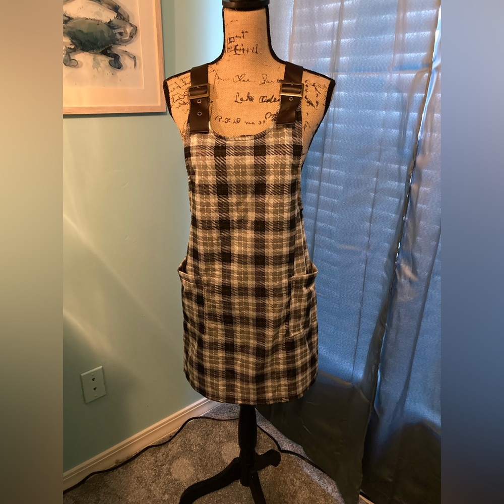 Halter dress, above the knee. Cute with leggings & boots!